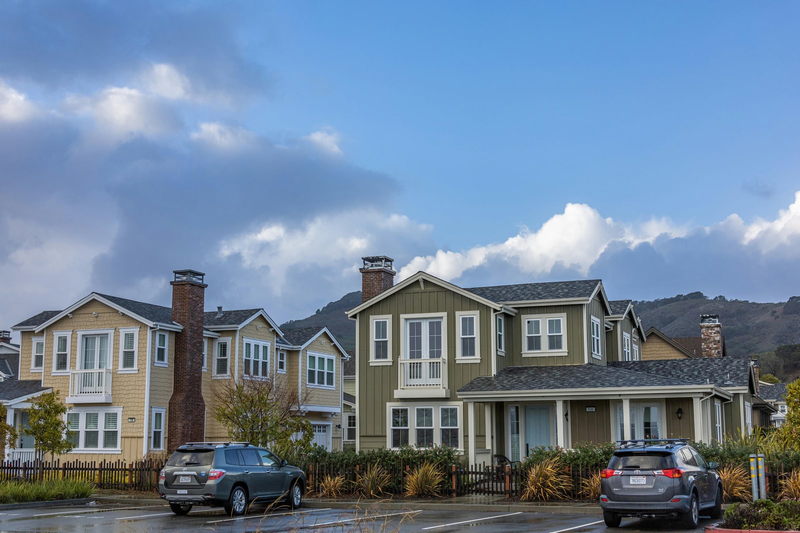 A row of suburban single-family rental homes in a residential neighborhood